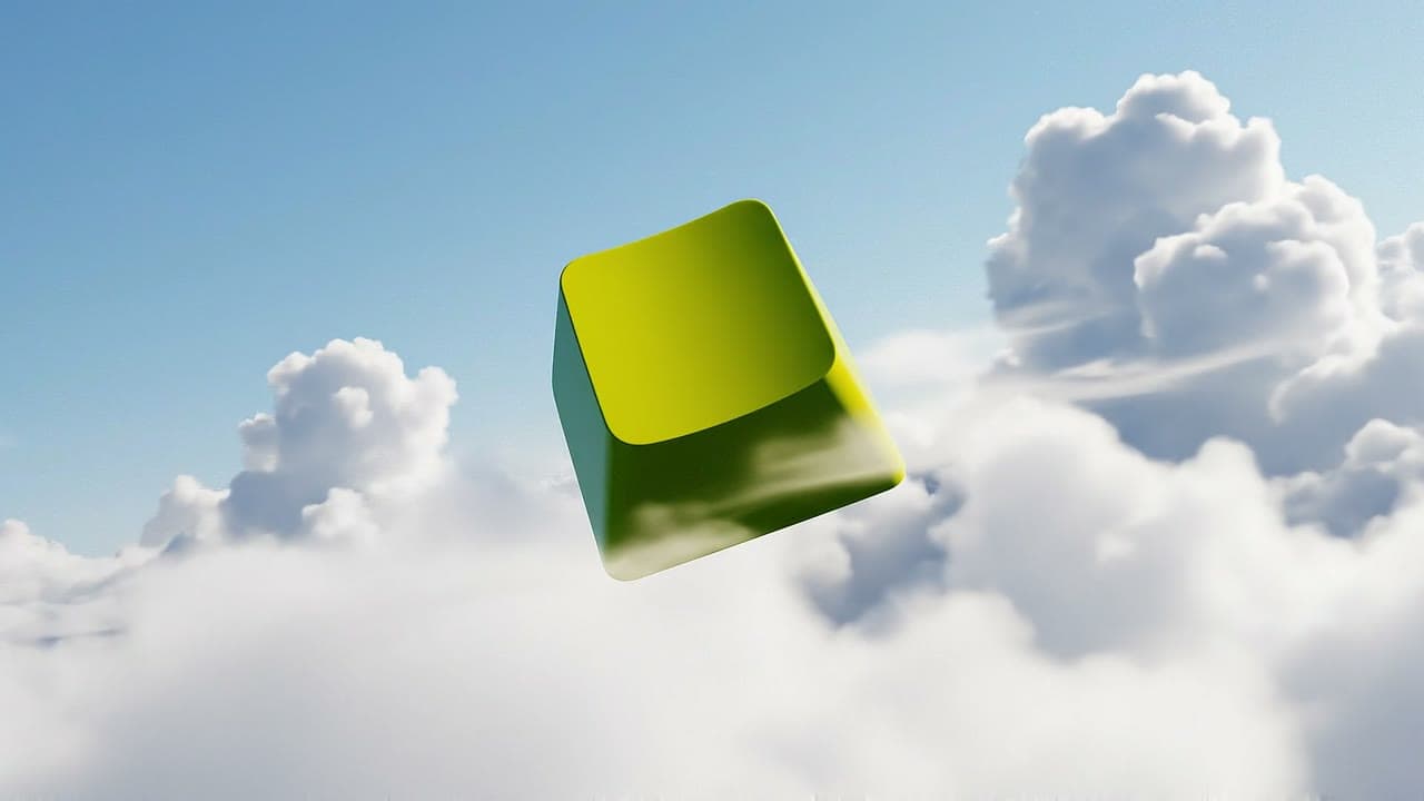 A chartreuse keycap drifting through soft white clouds